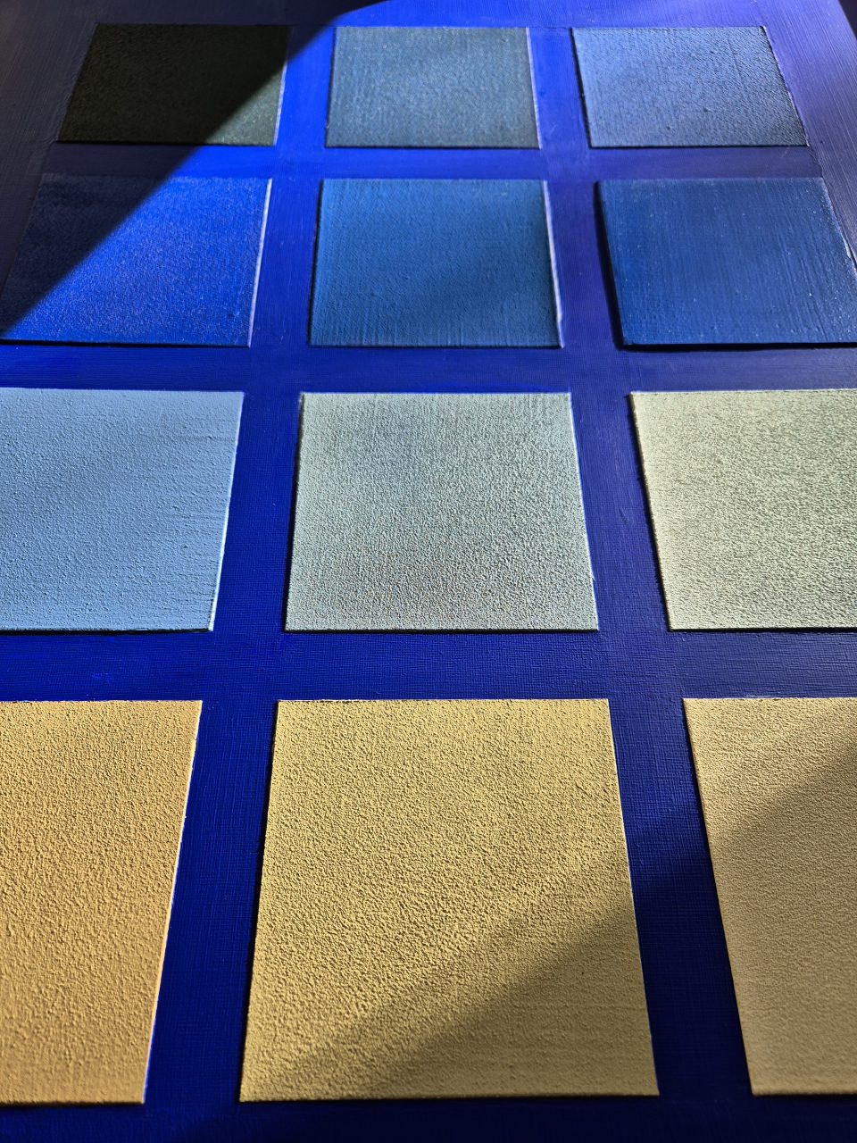 Strukturbild "Squares" 12 Farbfelder in Beige- und Blautönen Nahaufnahme