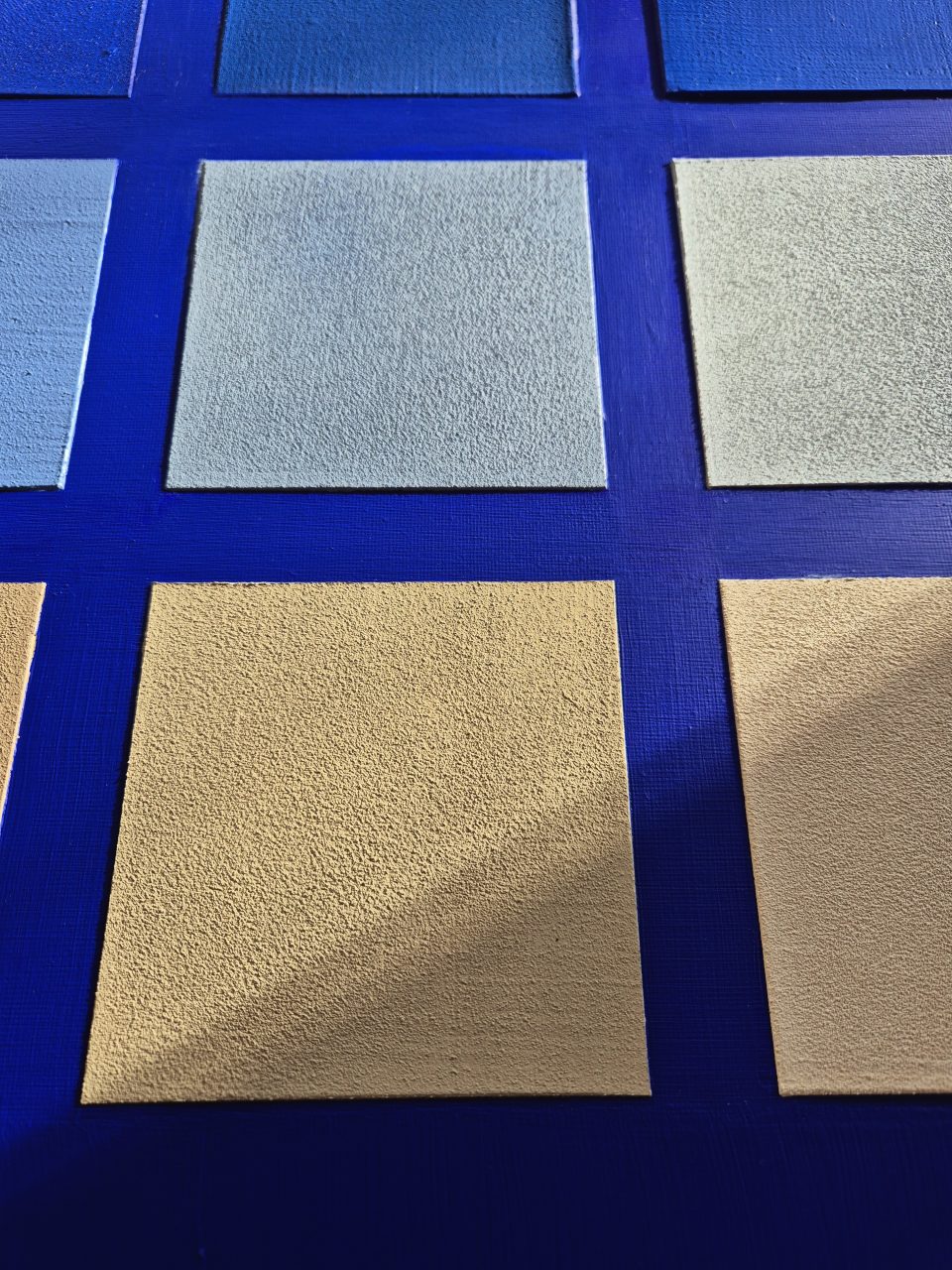 Strukturbild "Squares" 12 Farbfelder in Beige- und Blautönen Nahaufnahme